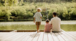 © BGStock72 - Relaxing afternoon fishing by the serene lake with loved ones