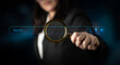 © InfiniteFlow - A businesswoman uses a magnifying glass to search for information in a digital environment. The image symbolizes exploration, analysis, and the quest for knowledge in a modern workspace. Cyphers