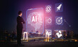 © InfiniteFlow - Business Professional Observing AI Technology Visualization Against Cityscape at Night with Futuristic Interface and Network Icons Quark.