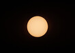 © Cavan Images - The full sun disk showing visible sunspots against a black sky