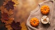 © KeyaRani - Cozy autumn background with pumpkins hot coffee and warm knitted sweater on wooden table