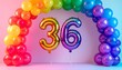 © Rendy Dastian - Colorful Rainbow Balloon Arch with Number Thirty Six for Birthday Celebration