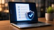 © Zaldy - Digital compliance checklist and secure document verification concept on laptop screen with protective shield representing legal contract and data privacy