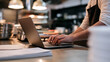 © A2Z AI  - Chef use laptop for restaurant business management in commercial kitchen interior with warm light, inventory check, menu plan and order