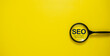 © NAZ - SEO Search Engine Optimization Concept with Magnifying Glass for Website Visibility, Online Search Ranking and Digital Marketing Strategy