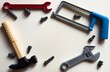 © Angelov - wall-mounted tool organizer in a workshop. Row of steel hand tools of various sizes for mechanical and repair work