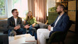 © master1305 - Couple discussing relationship goals with male family psychologist. Concept of shared goals, partnership planning, relationship growth, family wellbeing.
