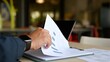 © Mdisk - Executive conducts financial analysis reviewing performance report, performing market analysis inside office space prior completing final sales report analysis covers internal business document.