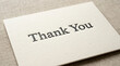 © Mr.Wazeer - Elegant thank you card on textured paper, minimalist gratitude note with black serif typography, professional appreciation stationery