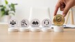 © USD - Hand positioning trust icon on stand alongside corporate value symbols