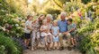 © Perfect Art - Happy grandparents surrounded by their five loving grandchildren sitting on a wooden bench in a beautiful, blooming summer flower garden