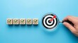 © LA Stock Vision - Quality management processes and business strategy planning shown through a target and check mark blocks.