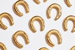 © Sofia - Golden Lucky Horseshoes Pattern on White