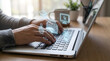 © MdHasan - Person using laptop computer with floating elearning icons representing online education online courses and distant learning concepts