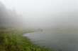 © leungchopan - Misty fog over mountain lake water in taiwan