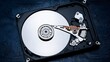 © MstTasmiya - Inside of internal Hard Drive HDD. dismantle from the computer. backup data, database recovery, and device repair service,