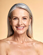 © Neural Canvas - Mature woman portrait with gray hair, smiling face, and natural beauty against warm background