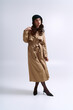© LIGHTFIELD STUDIOS - Young beautiful woman showcases stylish fashion in elegant pose