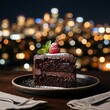 © acil - Chocolate cake with colorful sprinkles on plate.