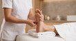 © Gates Studio - Professional foot massage therapy in a spa clinic for relaxation and wellness treatment.