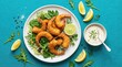 © PhotoHub - Fried shrimp with fresh salad, lemon wedges, and dipping sauce on a plate