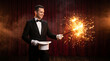 © PhotoArtHub - A magician in a tuxedo performs a trick with a sparkler and a hat, showcasing wonder and entertainment on a stage with red velvet curtains