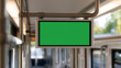 © twc - Blank mock up digital display screen with green screen chroma key inside public transport vehicle like bus or tram for commercial use ad