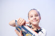 © Olga - Pretty 7 years old girl in black dress is posing in the photo studio with the book in hands. This photo has been taken in Prague, Czech Republic, August 2026