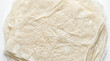 © darmo - Stack of thin crepes or flatbread with delicate bubbles