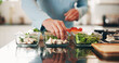 © peopleimages.com - Person, hands and diet with food container in kitchen for healthy meal prep or ready made snack. Culinary artist, vegetables or chef with vegetarian ingredients for wellness or eating plan in home