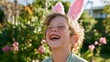 © World of AI - Child wearing bunny ear headband laughs joyfully in a garden filled with colorful flowers and greenery, showcasing a playful springtime atmosphere