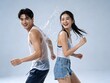 © aziseptian - Young asian couple laughing and splashing water during songkran