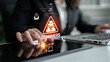 © InfiniteFlow - A businesswoman engages with a tablet, highlighting online scams and digital security alerts. This image emphasizes the importance of awareness in modern digital landscapes. Nascent