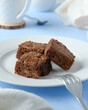 © David Moya - Freshly baked chocolate brownies serving delicious dessert snack