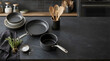 © Mc - Modern black cookware set on dark stone countertop, elegant kitchen utensils with nonstick frying pan and saucepan, culinary background 4 k