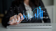 © InfiniteFlow - A professional examines financial data with a magnifying glass, highlighting trends and statistics on a digital display, symbolizing informed business analysis and decision-making. Scalp