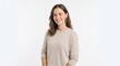 © Max_T - Portrait of a smiling young woman with wavy brown hair wearing a beige sweater and gold jewelry isolated on white background