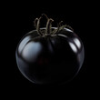 © boule1301 - Black tomato with glossy skin, isolated on black background with clipping path. Concept of organic vegetables and healthy food