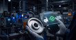 © Bano - Factory worker scanning metal gear part barcode using modern smartphone with futuristic holographic interface