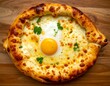 © Sherli Sintia Dewi - Georgian khachapuri cheese bread egg center top view