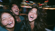 © BlackBridge Media - Happy Young Friends Laughing During Nightlife Party Cruise