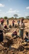 © pulpen - Group of people digging in dry rural landscape.