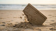 © MP-AI - Sand credit card buried in beach sand while financial report shows decline