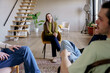 © AD Astra Team/Stocksy - Addiction recovery support group therapy session