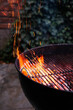 © Justin Mullet/Stocksy - Charcoal Grill With Flames and Sparks