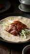 © Fchri - Peking duck slices roasted crispy on thin wheat pancake with scallions
