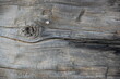 © Михаил Кривовяз - Close-up of aged weathered wooden planks with cracked, peeling, and rough natural grain. Gray and brown tones create a rustic, distressed surface texture suitable for backgrounds, vintage designs, con
