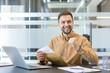 © Liubomir - Success and career achievement, happy businessman celebrating good news with a letter in a modern office. Professional man reading correspondence and clinching fist in excitement, business growth.