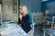 © ADDICTIVE STOCK - Middle-aged blond woman work at home office computer