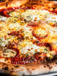 © ADDICTIVE STOCK - Salami pizza with mozzarella cheese and tomato sauce